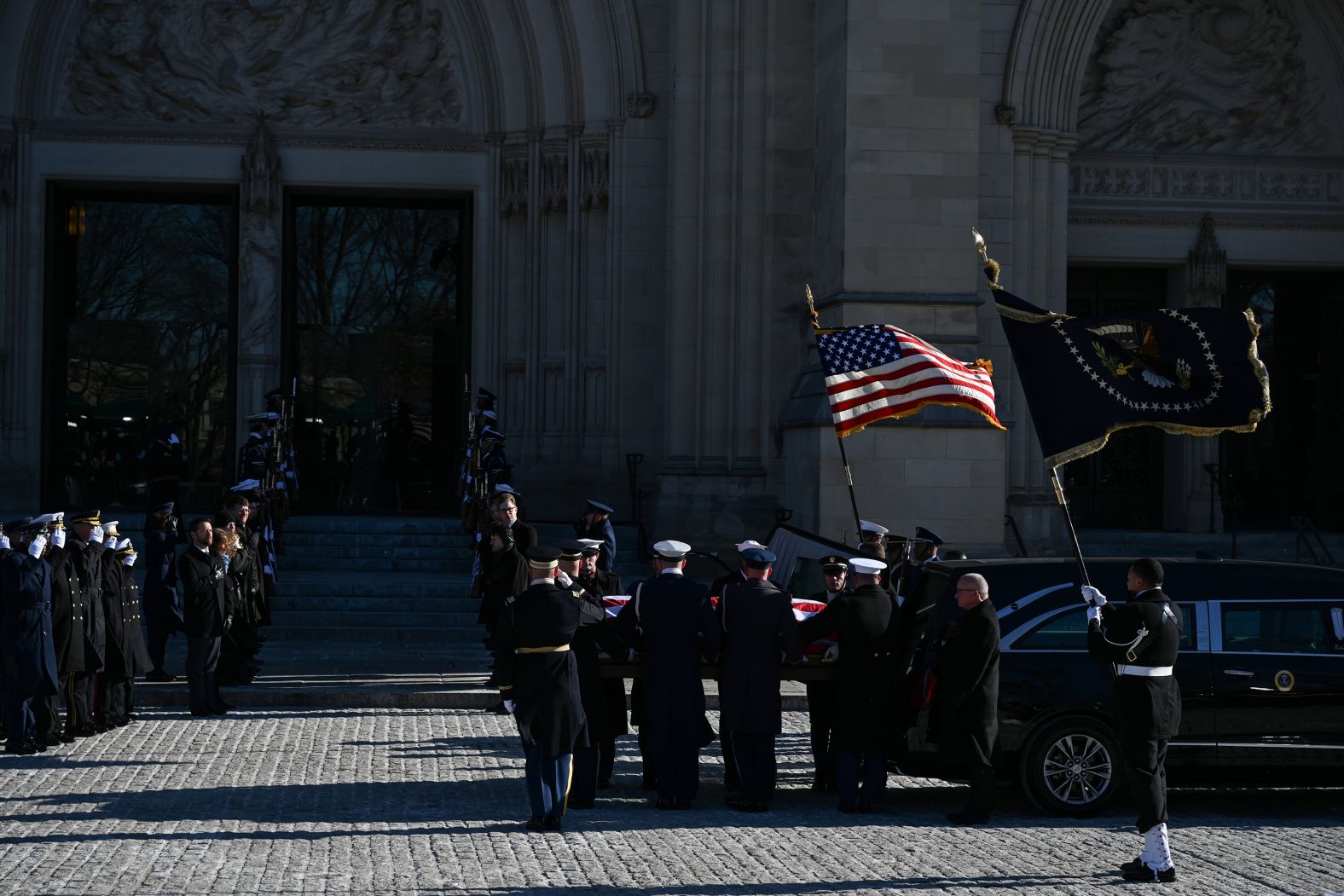 The casket of former US President Jimmy Carter arrives at the Washington National Cathedral for his funeral on Thursday, January 9.