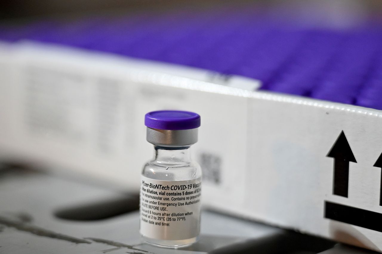 A vial containing the Pfizer-BioNTech Covid-19 vaccine is seen on December 8 in Glasgow, Scotland.