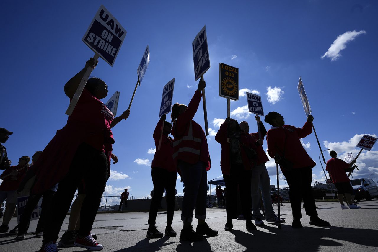 United Auto Workers members walk the picket line at the Ford Michigan Assembly Plant in Wayne, Michigan, on September 18.