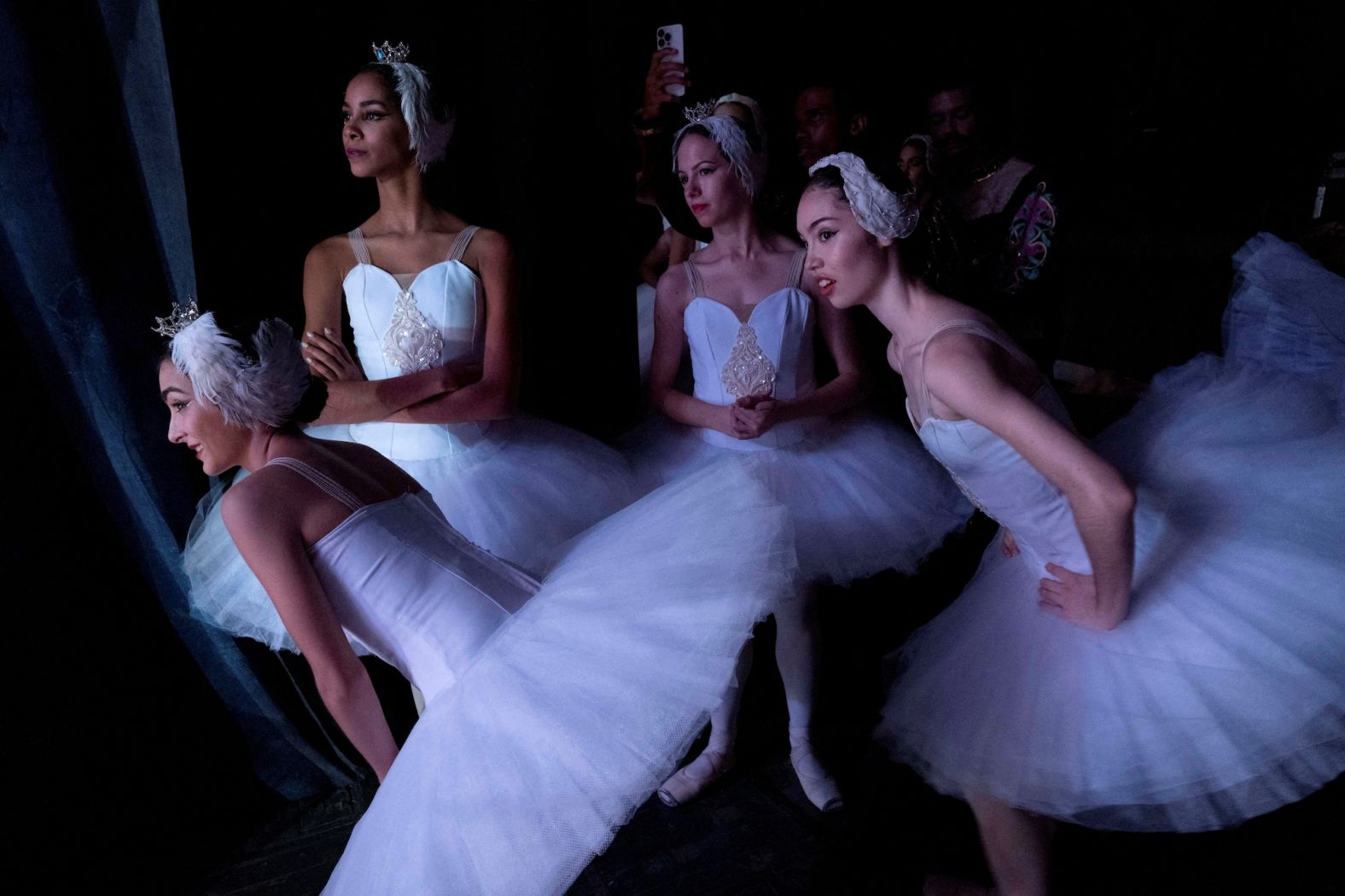 Ballet dancers prepare to perform “Swan Lake” at the National Theatre in Havana, Cuba, during the Alicia Alonso International Ballet Festival of Havana on Saturday, November 9.