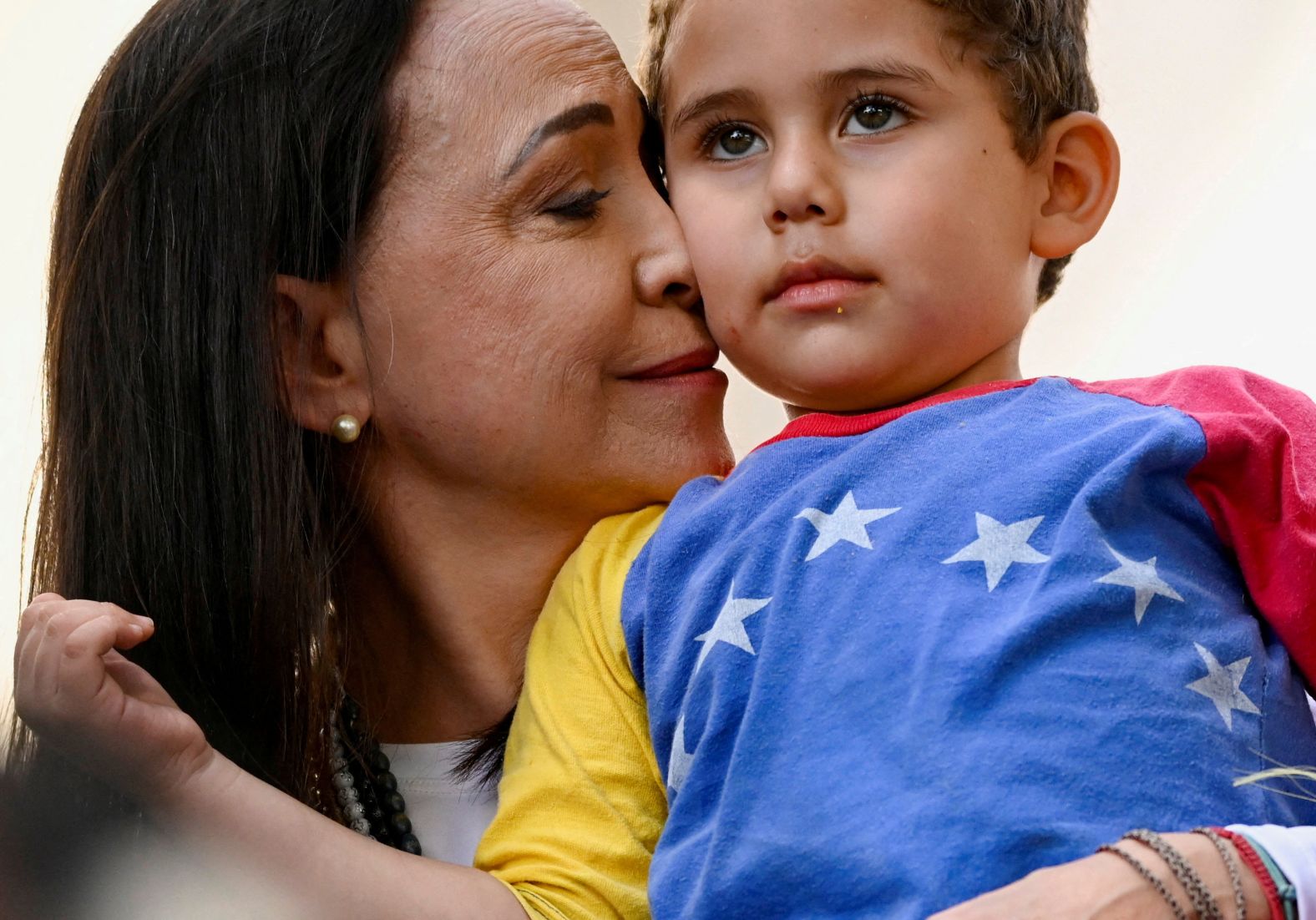 Venezuelan opposition leader Maria Corina Machado embraces a child at a protest in the capital of Caracas on Thursday, January 9. Machado’s political group wrote on X that she had been <a href="index.php?page=&url=https%3A%2F%2Fwww.cnn.com%2F2025%2F01%2F09%2Famericas%2Fmaria-corina-machado-venezuela-protests-intl-latam%2Findex.html">“violently intercepted”</a> while exiting the rally, which was held on the eve of President Nicolas Maduro’s inauguration. In a later update, her team posted that “during the period of her kidnapping she was forced to record several videos and was later released.” The Venezuelan government has denied detaining Machado.