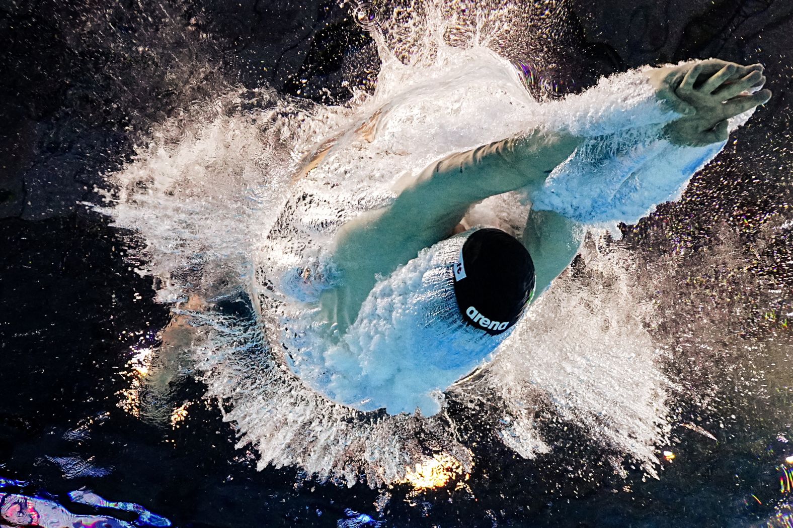 Irish swimmer Daniel Wiffen dives into the water for an 800-meter freestyle race at the World Aquatics Championships on Tuesday, July 29.