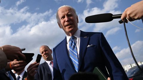 US President Joe Biden speaks to members of the media prior to boarding Air Force One in Des Moines, Iowa on April 12.