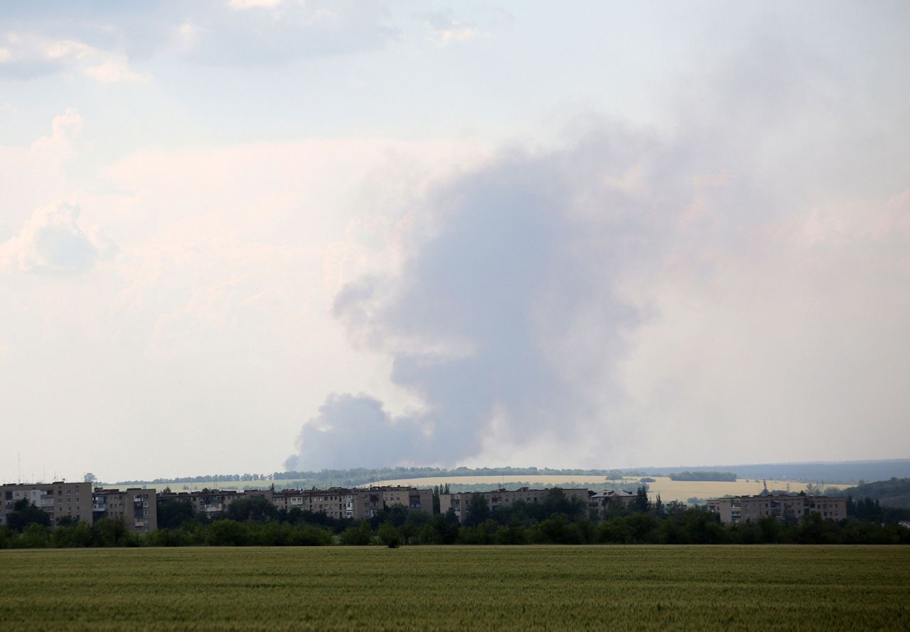 Black smoke is seen over the city of Lyman on June 14.