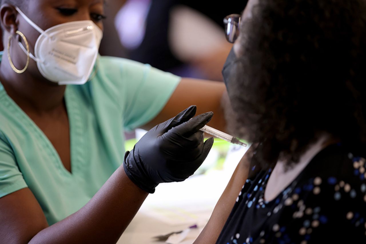 Maryland residents receive their second dose of the Moderna coronavirus vaccine at the Cameron Grove Community Center on March 25, 2021 in Bowie, Maryland.?