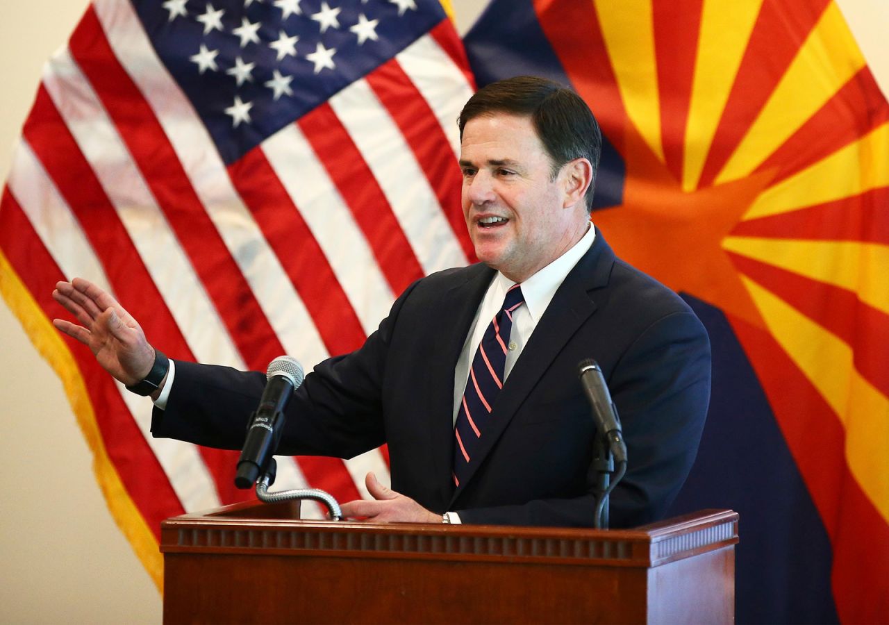 Arizona Gov. Doug Ducey gives an update on the Covid-19 pandemic response, on April 14, in Phoenix, Arizona.