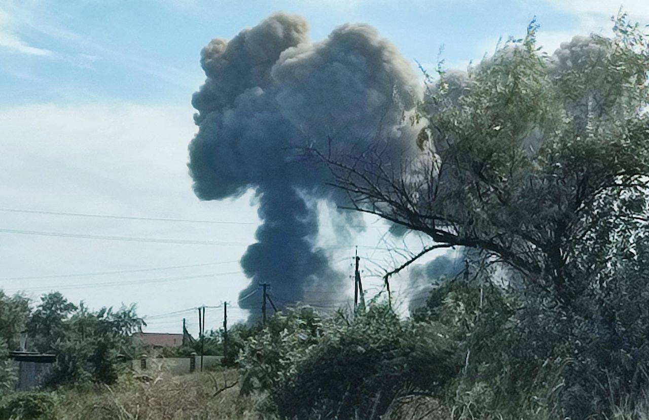 Smoke rises after explosions were heard from the direction of a Russian military airbase near Novofedorivka,?Crimea?on August 9.