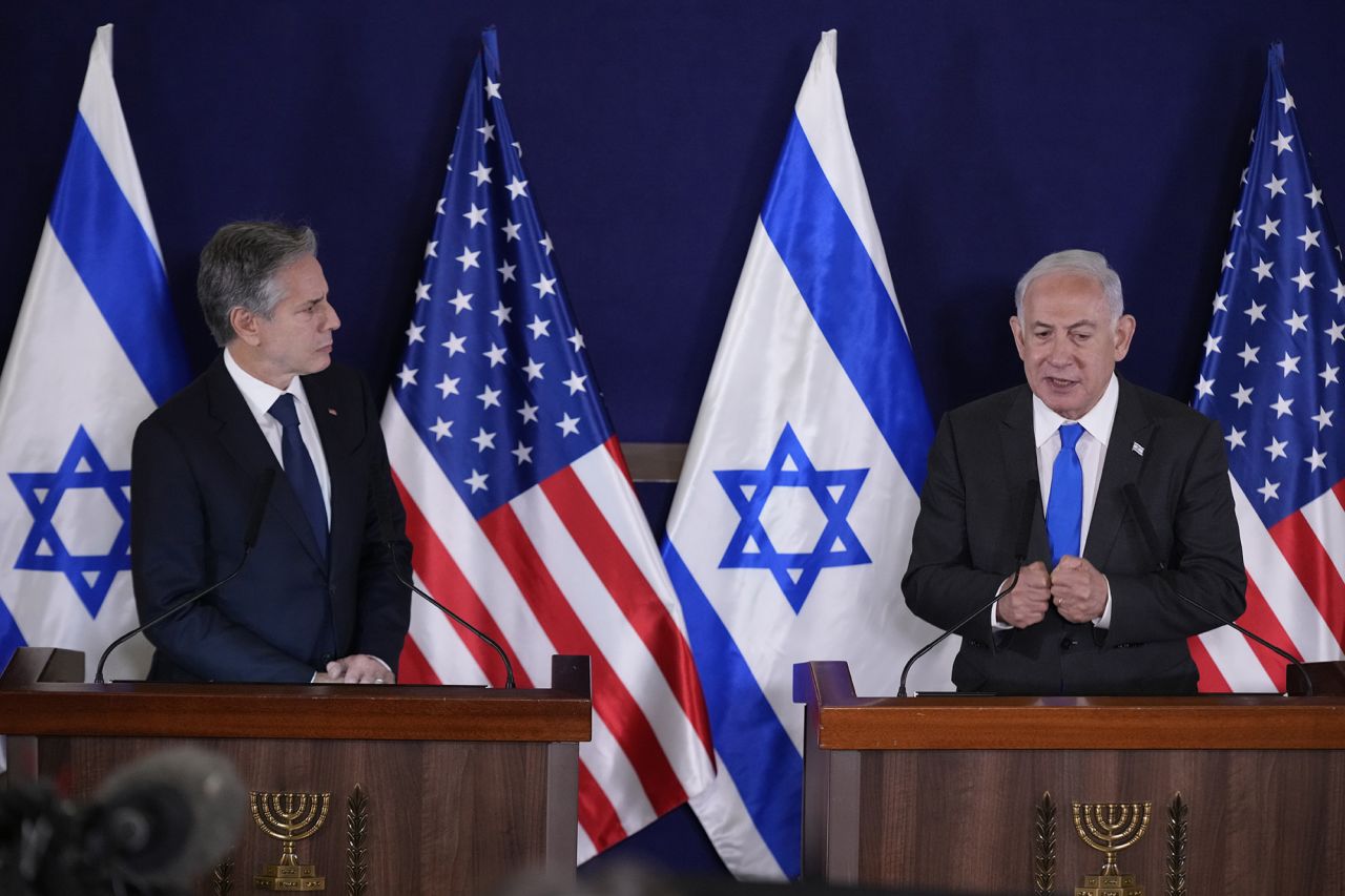 U.S. Secretary of State Antony Blinken, left, and Israel's Prime Minister Benjamin Netanyahu make statements to the media inside The Kirya, in Tel Aviv, Israel, on October 12.