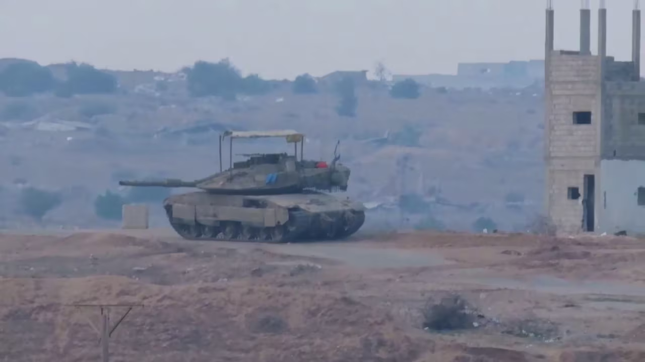 In this still from a video geolocated by CNN, an Israeli tank is positioned in the Tal Zurob neighborhood in western Rafah, Gaza, on May 29.