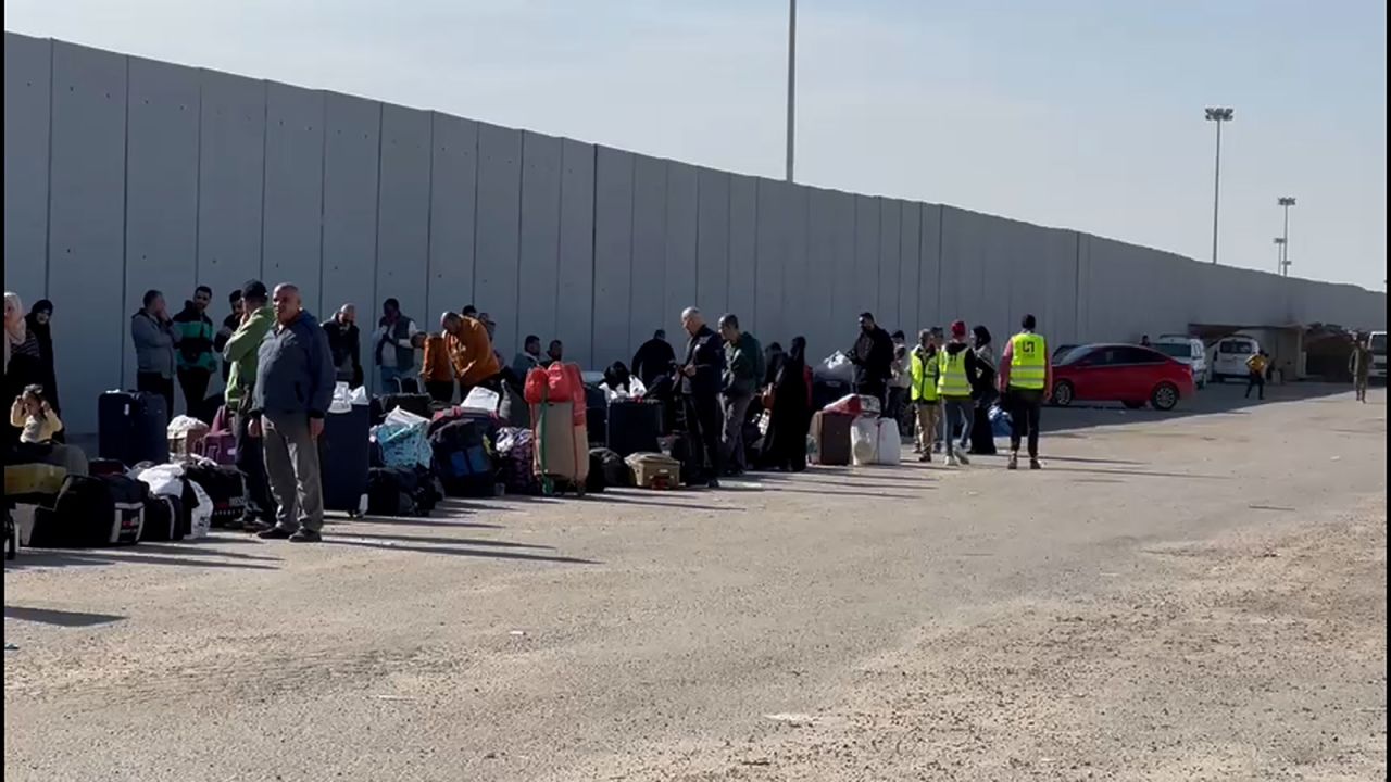 People gather at Rafah Crossing in Egypt.