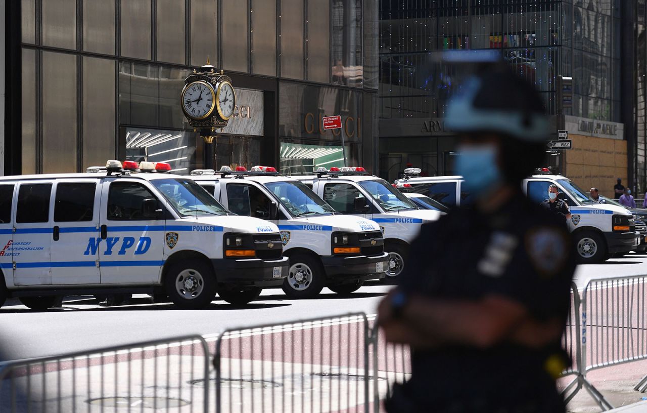 A NYPD officer stands guard on 5th Avenue at Trump Tower during a protest against police brutality and racial inequality in the aftermath over the death of George Floyd?on June 12 in New York City. 