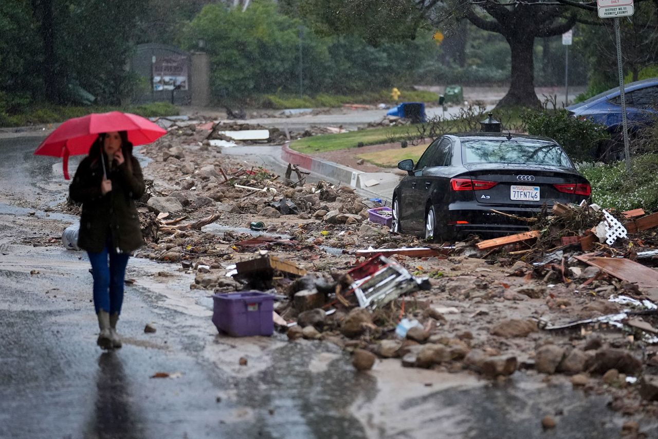 Mud and debris is strewn on Fryman Road on Monday in Studio City, California. 