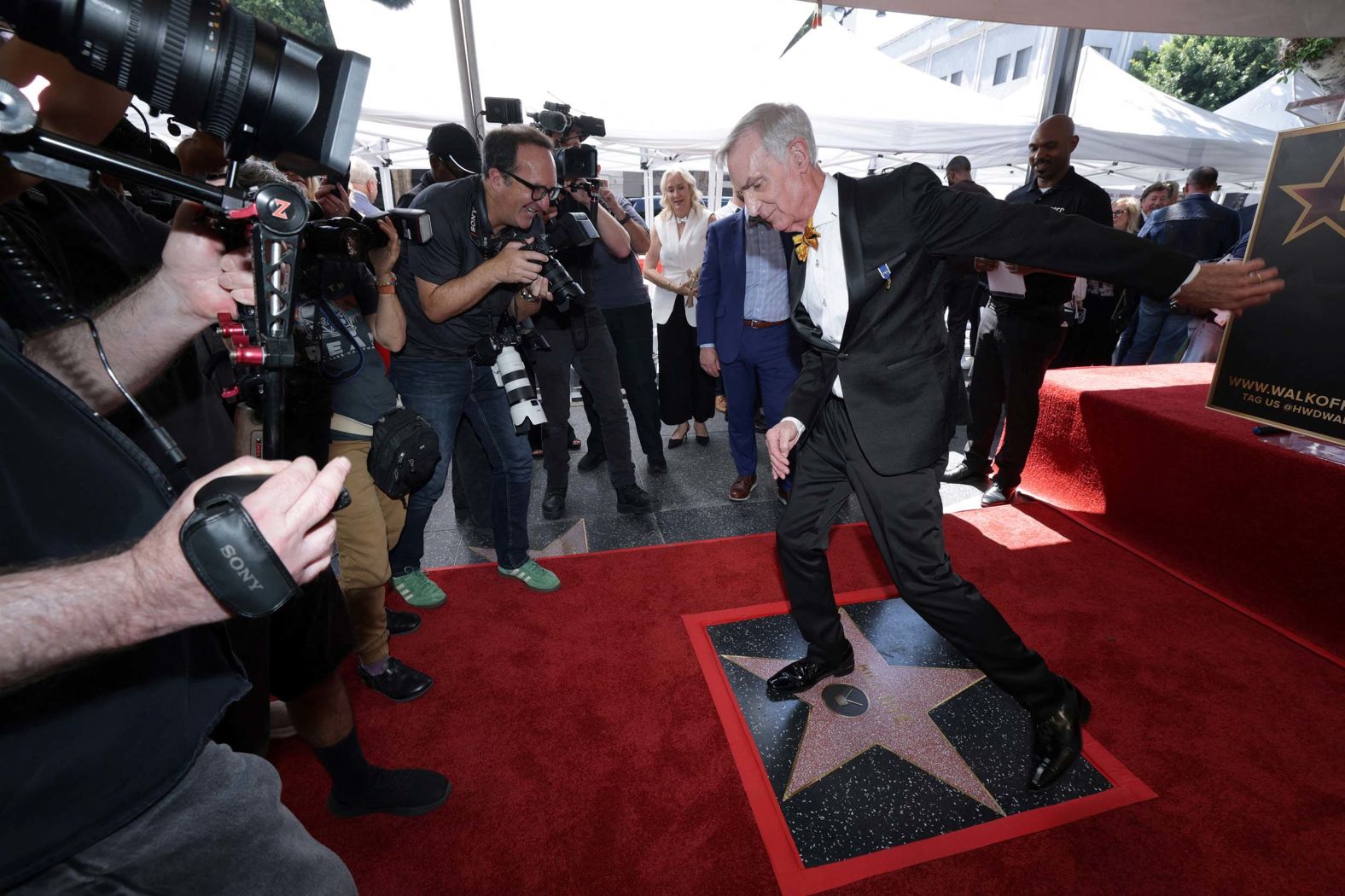 Television presenter Bill Nye dances on his star after it was unveiled on the Hollywood Walk of Fame on Monday, September 22.
