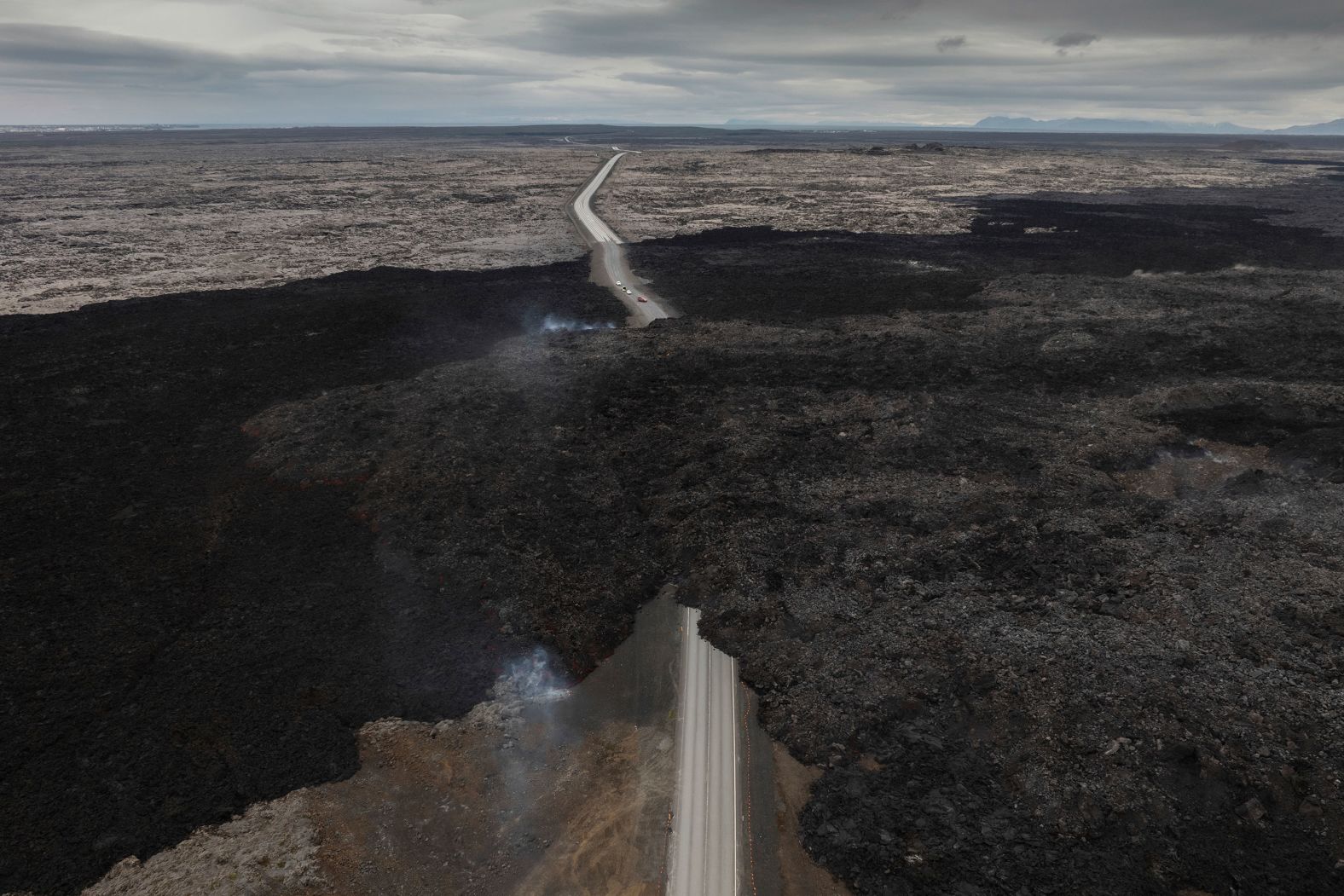 Lava from an active volcano engulfs the road near Grindavík, Iceland, on Saturday, June 8.