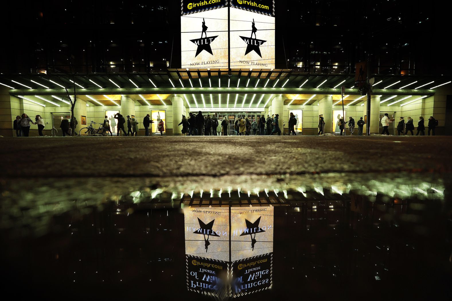 Theatergoers in Toronto arrive at a performance of "Hamilton" in 2023.