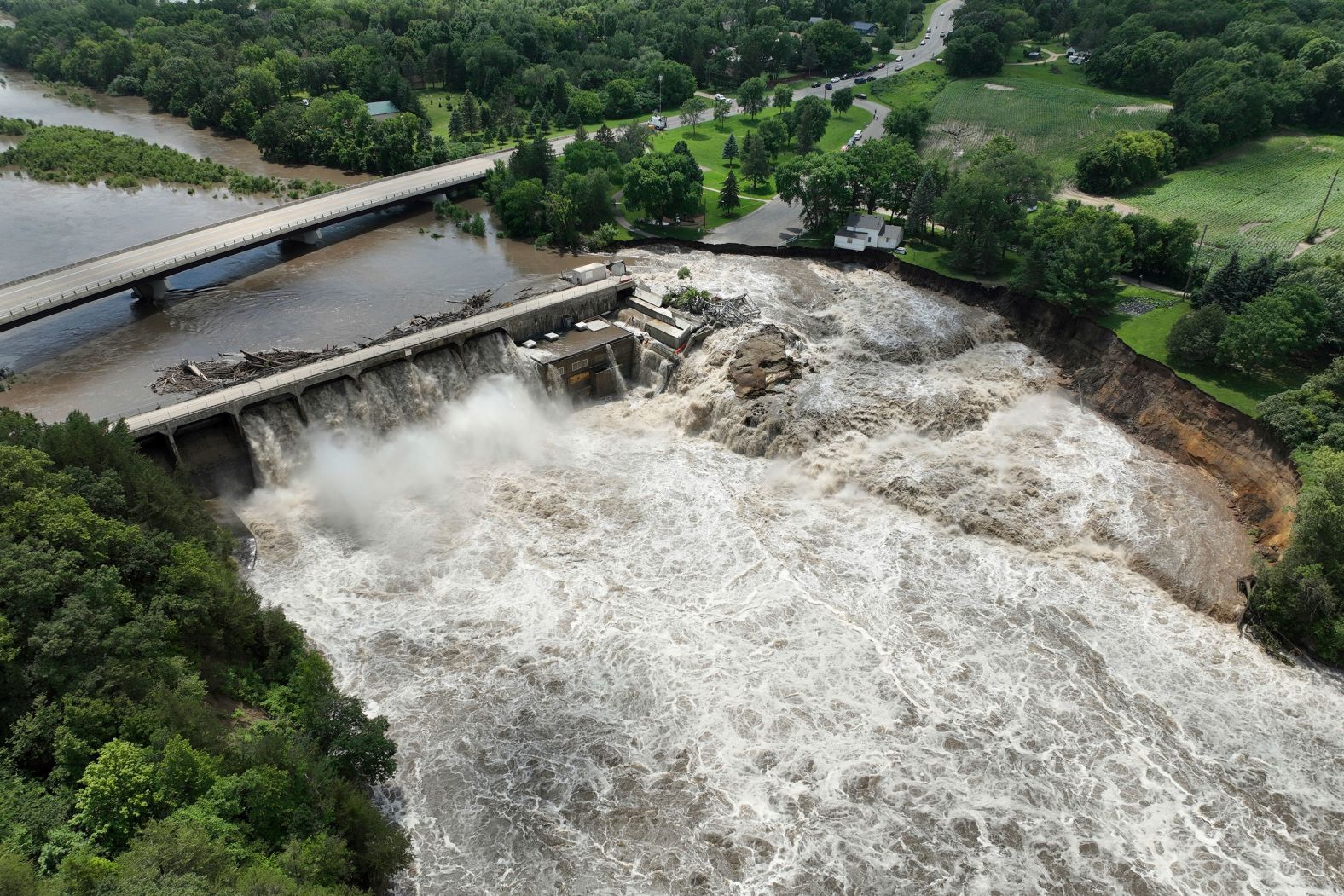 Heavy rains cause high water levels at the Rapidan Dam near Mankato, Minnesota, on Monday, June 24. Officials said Monday that the dam was in <a href="index.php?page=&url=https%3A%2F%2Fwww.cnn.com%2F2024%2F06%2F26%2Fus%2Fminnesota-house-river-rapidan-dam%2Findex.html">“imminent failure condition.”</a>