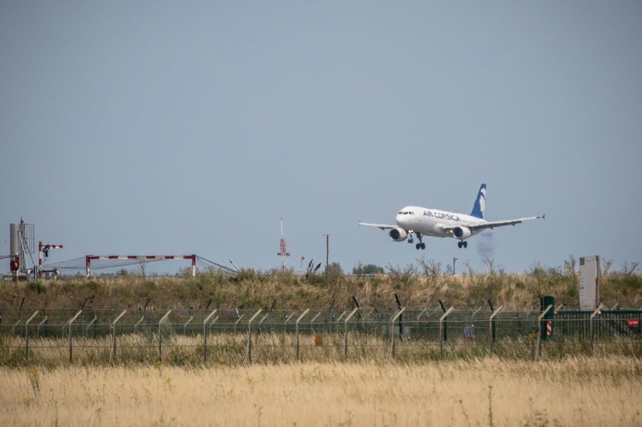 An Air Corsica aircraft lands at Paris Orly Airport near Paris on June 26.