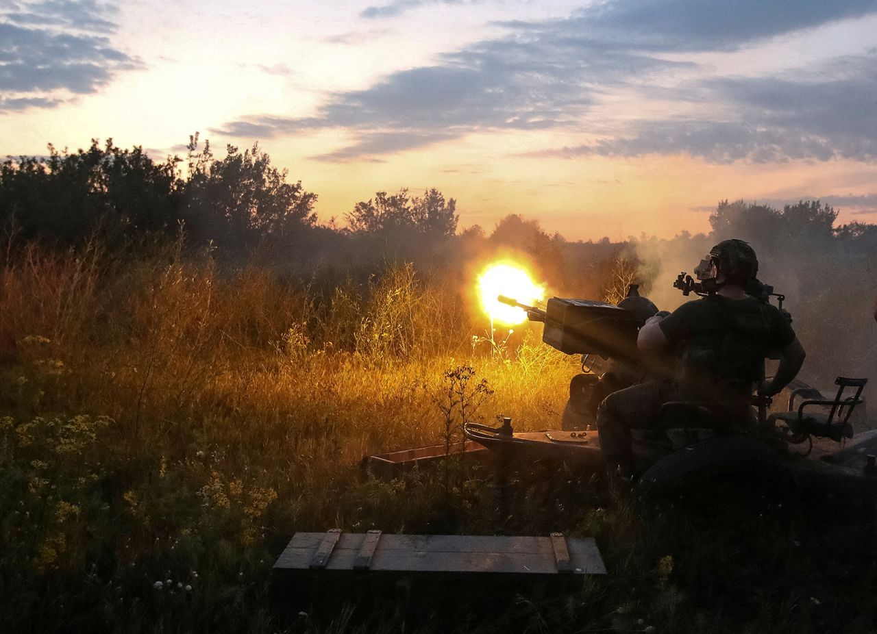 A Ukrainian serviceman fires an anti-aircraft cannon at a position near a front line in the?Ukraine's Kharkiv?region, on Aug. 10. 