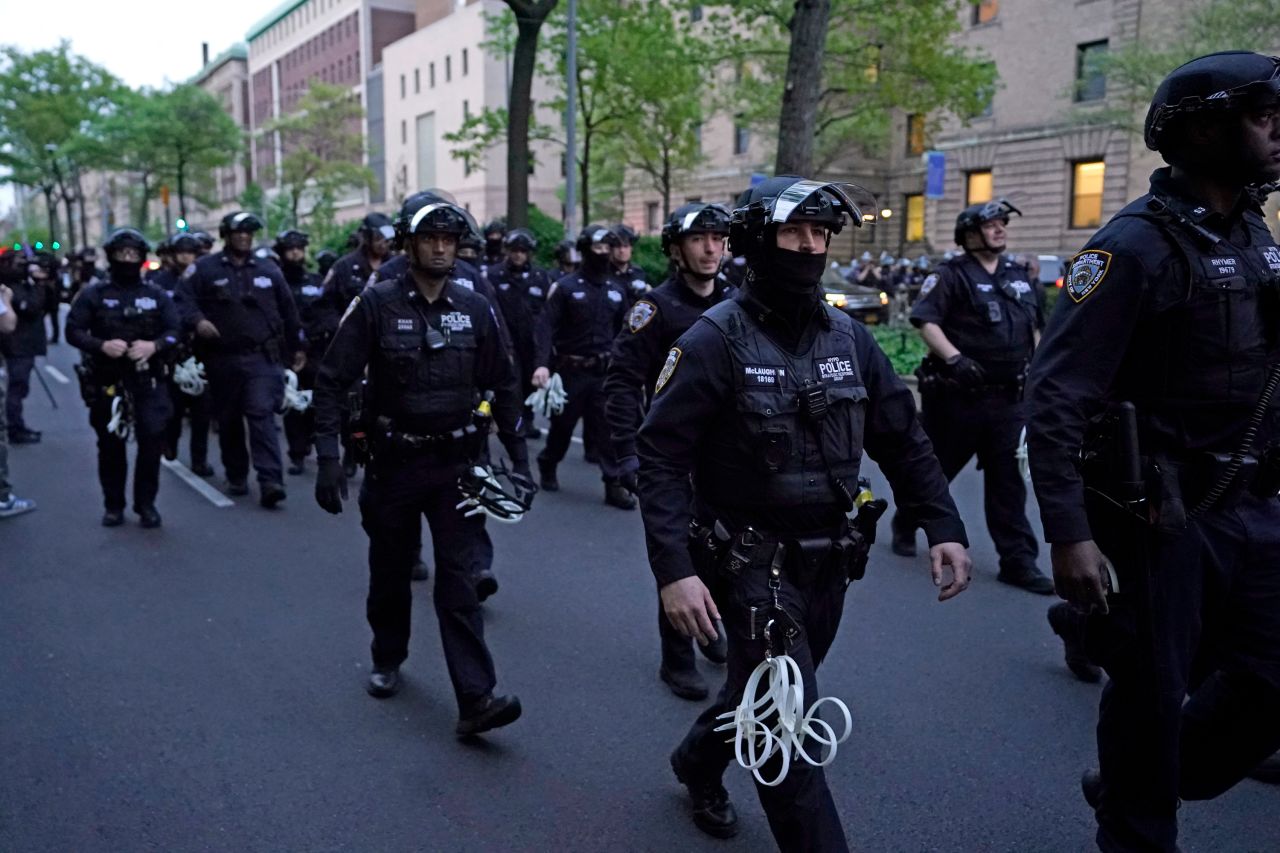 NYPD officers arrive near Columbia University where pro-Palestinian students are barricaded inside a building and have set up an encampment in New York City on April 30, 2024.