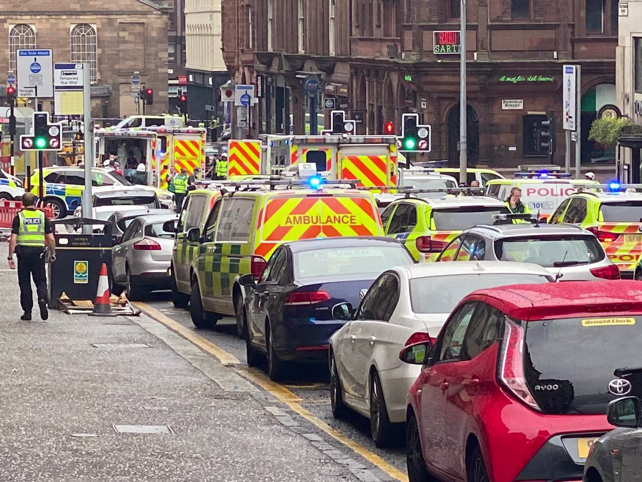 Emergency responders are seen near the scene of a reported incident in Glasgow, Scotland, on June 26, in this picture obtained by Reuters from social media.