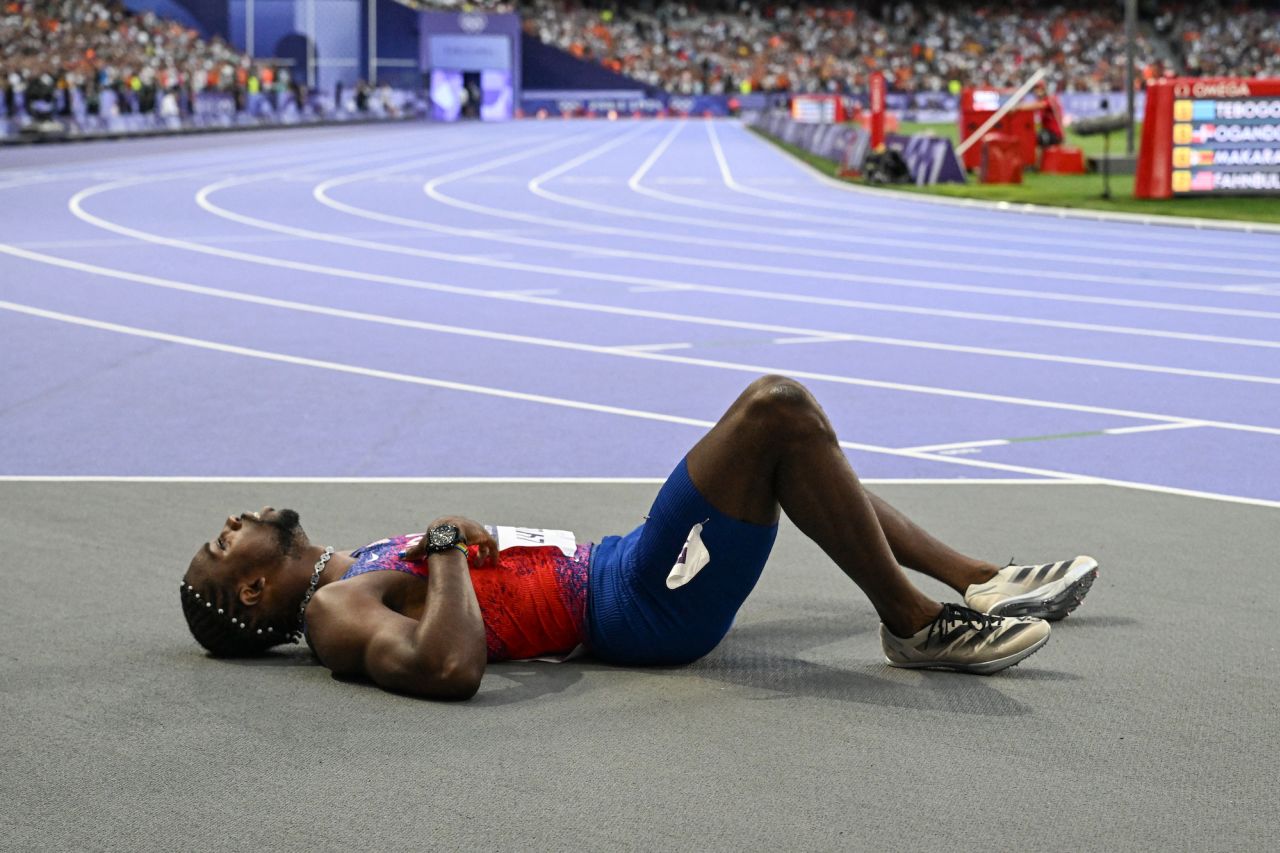 Noah Lyles reacts after competing in the men's 200m final at Stade de France in Saint-Denis.