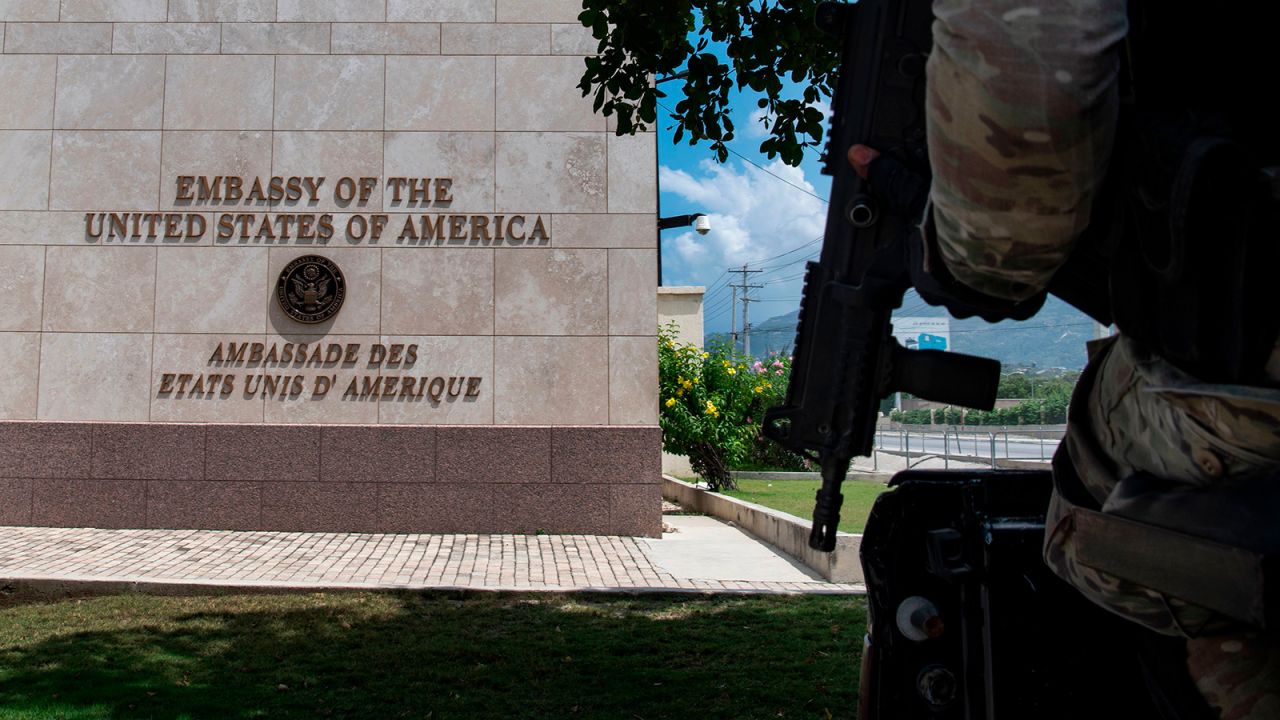 In this April 29, 2019 file photo, Haitian security personnel guard outside the US Embassy in the Haitian capital Port-au-Prince.