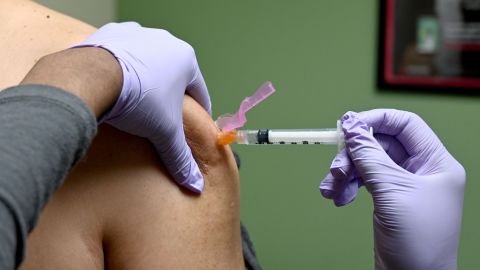 A man gets a flu shot at a health facility in Washington, DC, in January.