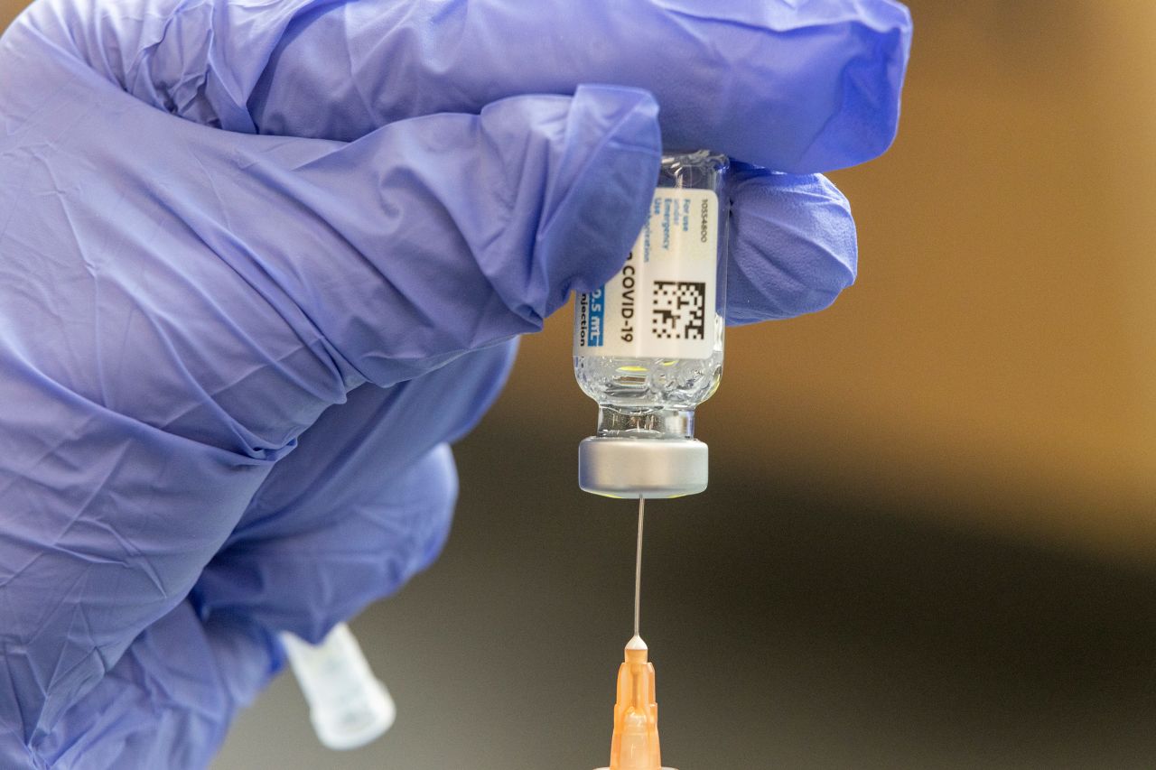 A healthcare worker loads a syringe with the Johnson & Johnson Covid-19 vaccine on March 26, in Buffalo, West Virginia.?