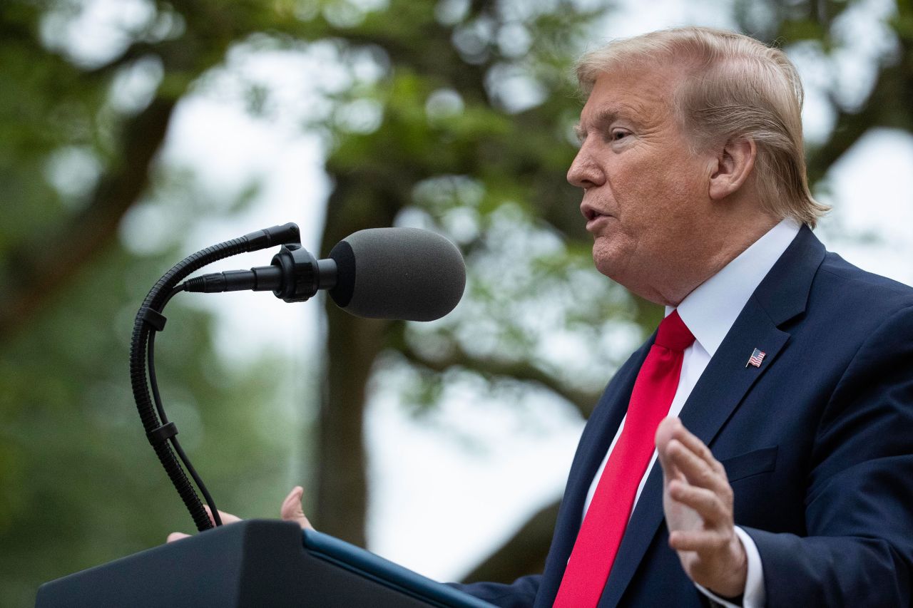 President Donald Trump speaks at a news briefing in the Rose Garden of the White House, on April 14, in Washington.