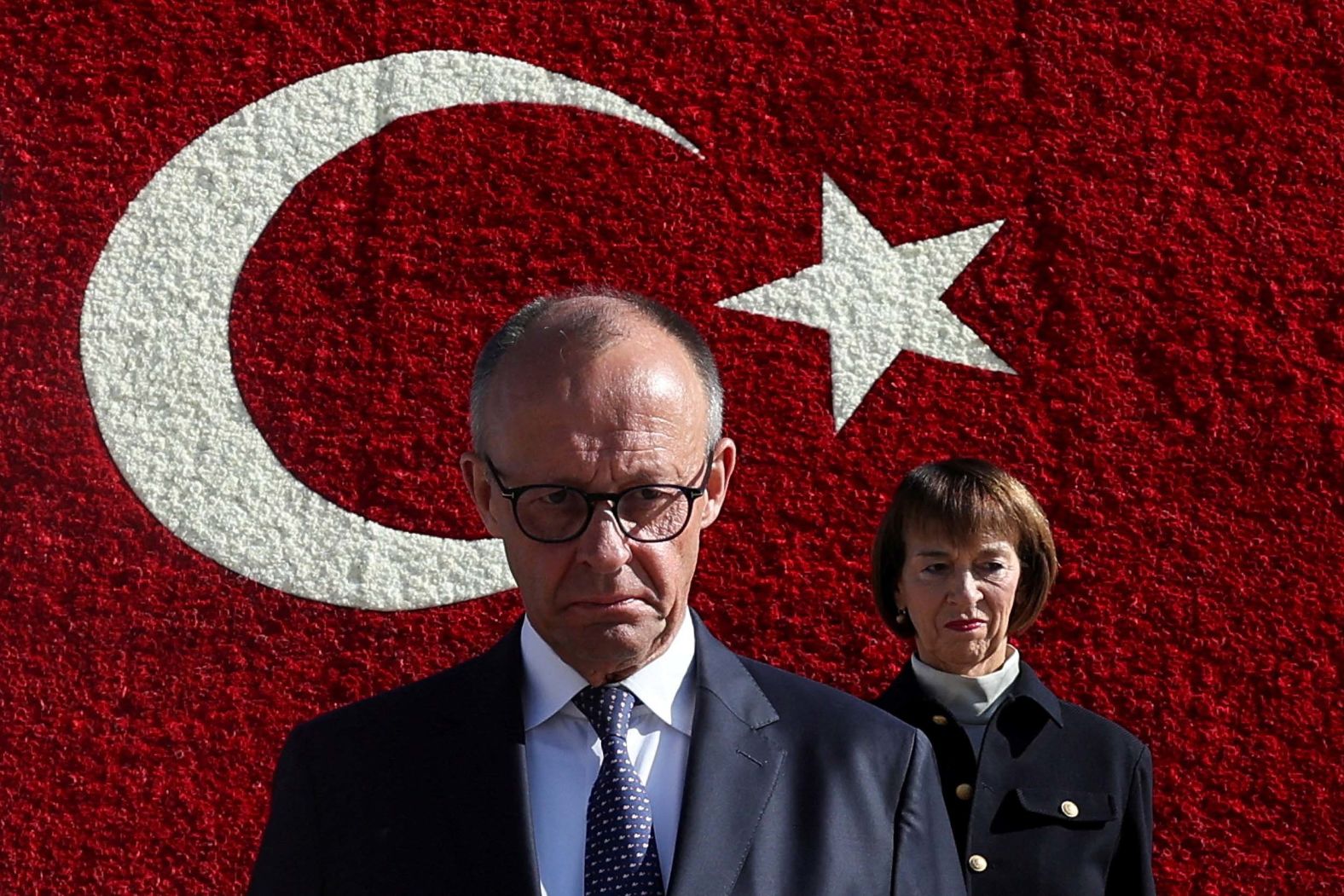 German Chancellor Friedrich Merz walks with his wife, Charlotte, during a wreath-laying ceremony at Anitkabir, the mausoleum of modern Turkey's founder, in Ankara, Turkey, on Thursday, October 30.