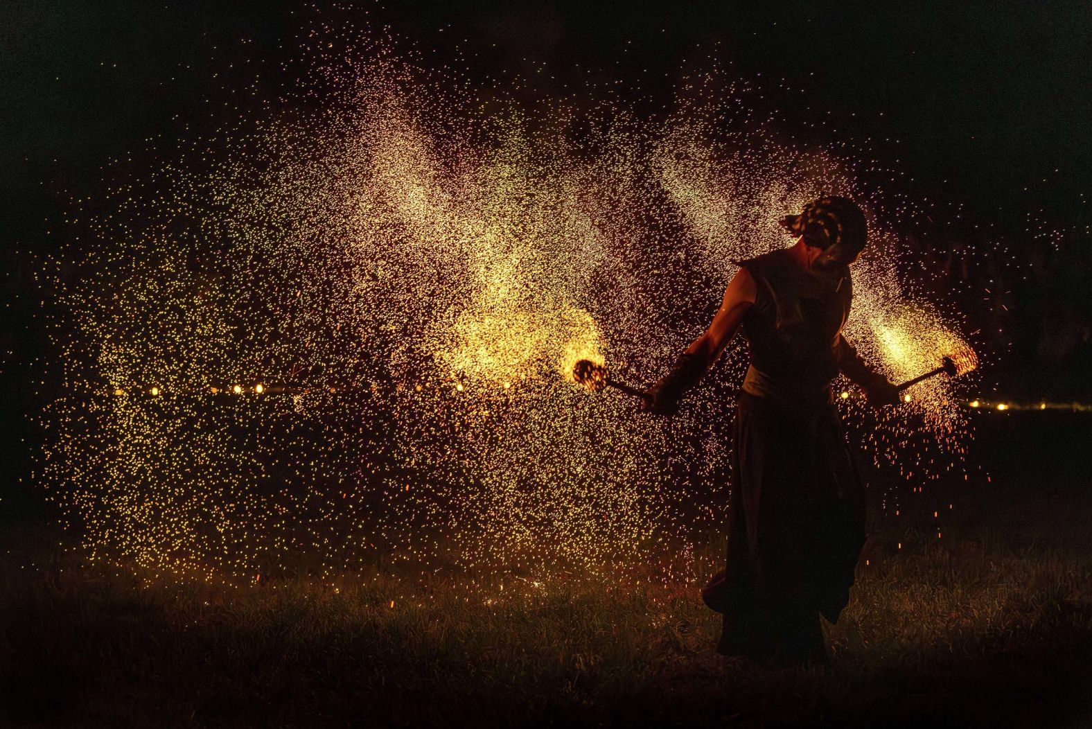 People participate in fire rituals during the Autumn Equinox celebration in Vilnius, Lithuania, on Monday, September 22.