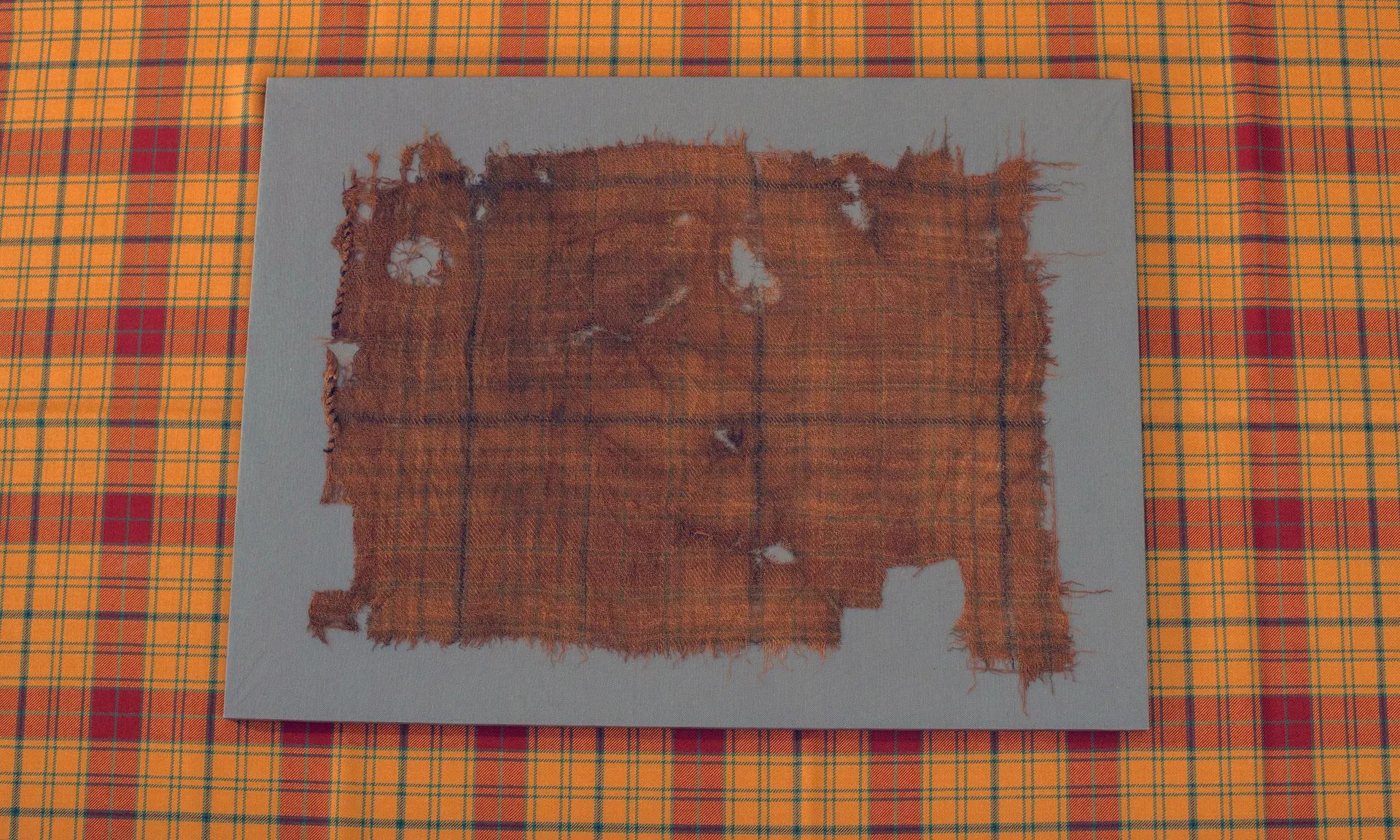 Scotland's oldest tartan, found in a peat bog, has been recreated and is  now available to buy