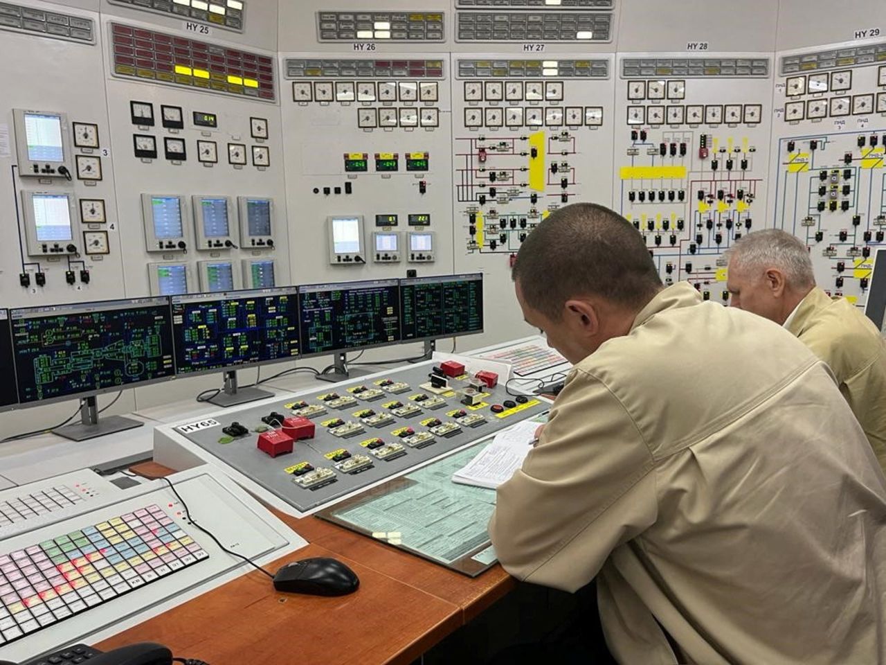 Employees work at the Russian-controlled?Zaporizhzhia?nuclear power plant during a visit by members of the International Atomic Energy Agency (IAEA) mission on September 2.