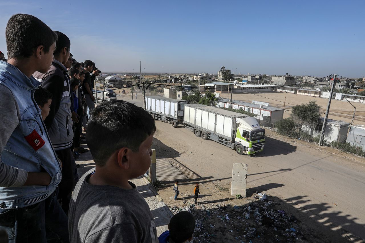 Trucks carrying humanitarian aid enter Gaza through the Rafah border crossing on November 24. 