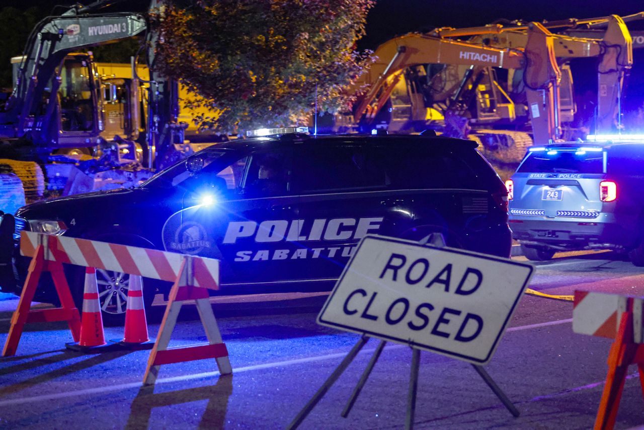 Police arrive at the scene of a mass shooting in Lewiston, Maine, on October 25. 