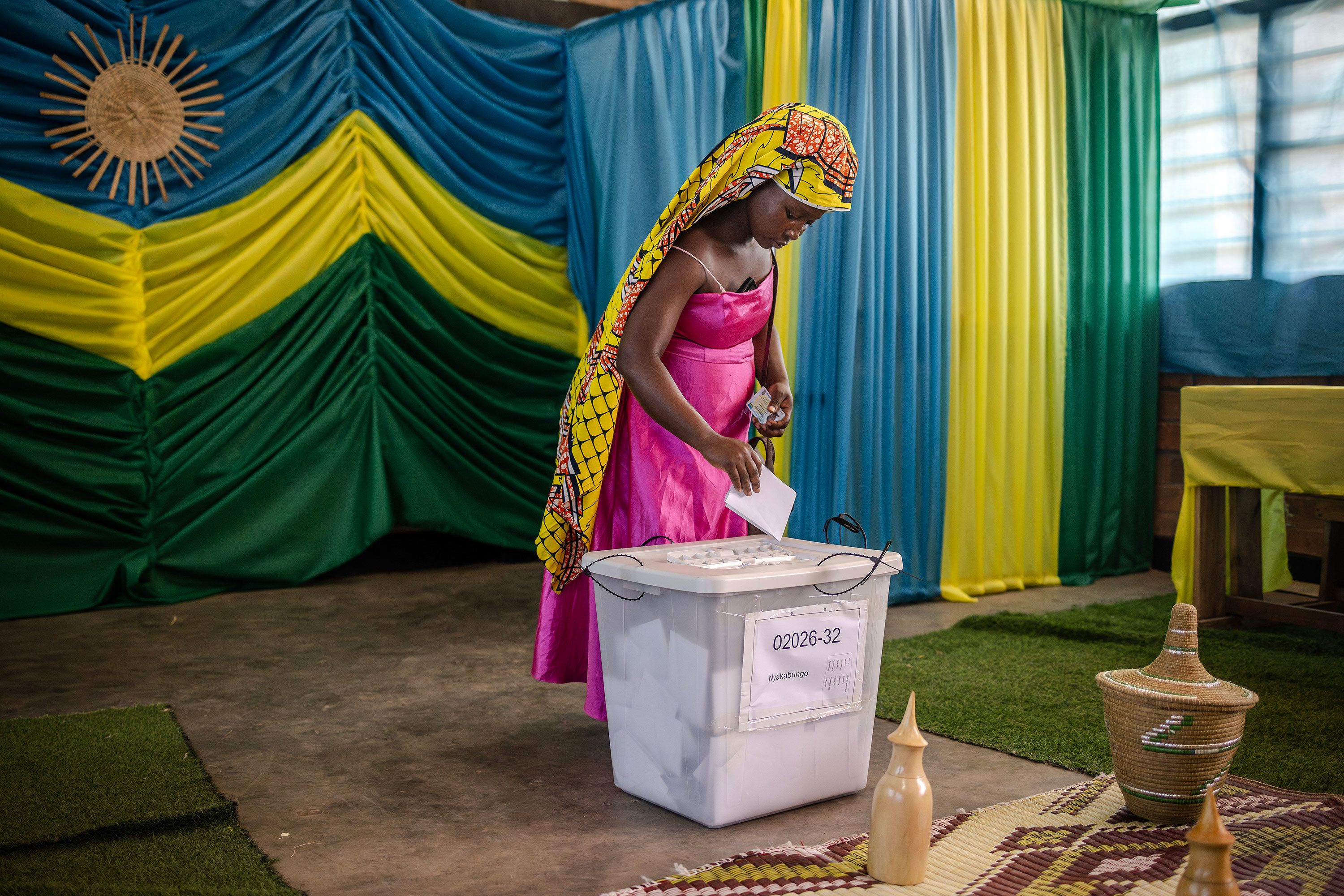 A woman casts her ballot at a polling station in Kigali, Rwanda, on Monday, July 15. <a href="https://www.cnn.com/2024/07/15/africa/rwanda-election-polls-open-intl/index.html">Early results put incumbent Paul Kagame in the lead</a> in a vote widely expected to give him a fourth term.