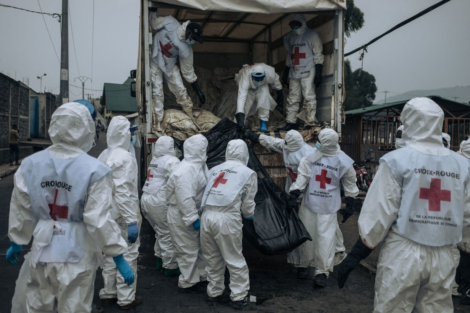 Members of the Congolese Red Cross unload bodies from a truck before burying them at a cemetery in Goma, Democratic Republic of Congo, on Monday, February 3. <a href="https://www.cnn.com/2025/02/06/africa/dr-congo-goma-violence-deaths-intl-hnk/index.html">Nearly 3,000 people have been killed in Goma</a>, according to the United Nations, after it was captured by rebels following days of fierce fighting with the Congolese army.