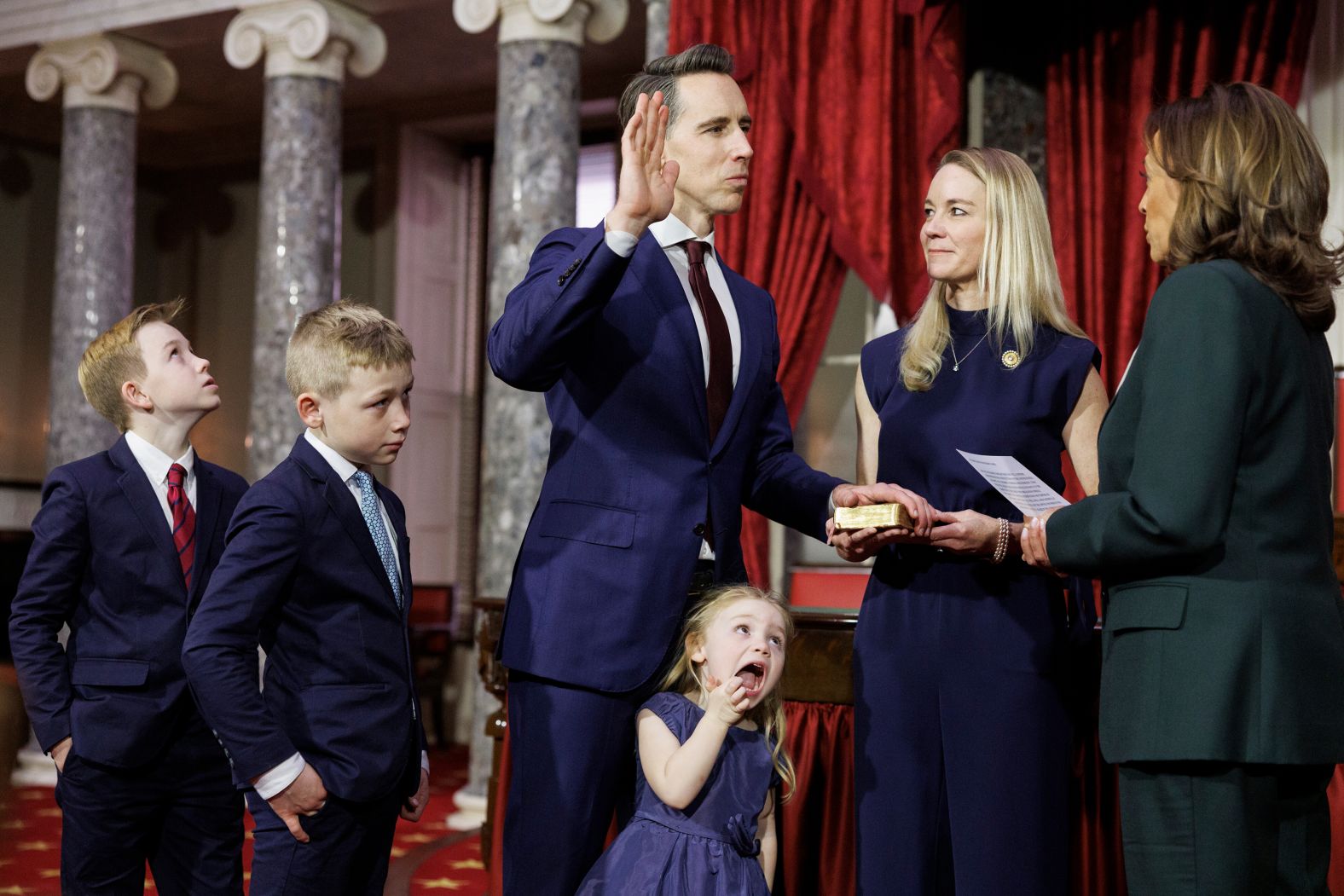 US Sen. Josh Hawley is joined by his wife, Erin, and their children on Friday, January 3, as Vice President Kamala Harris conducts his ceremonial swearing-in at the Capitol.