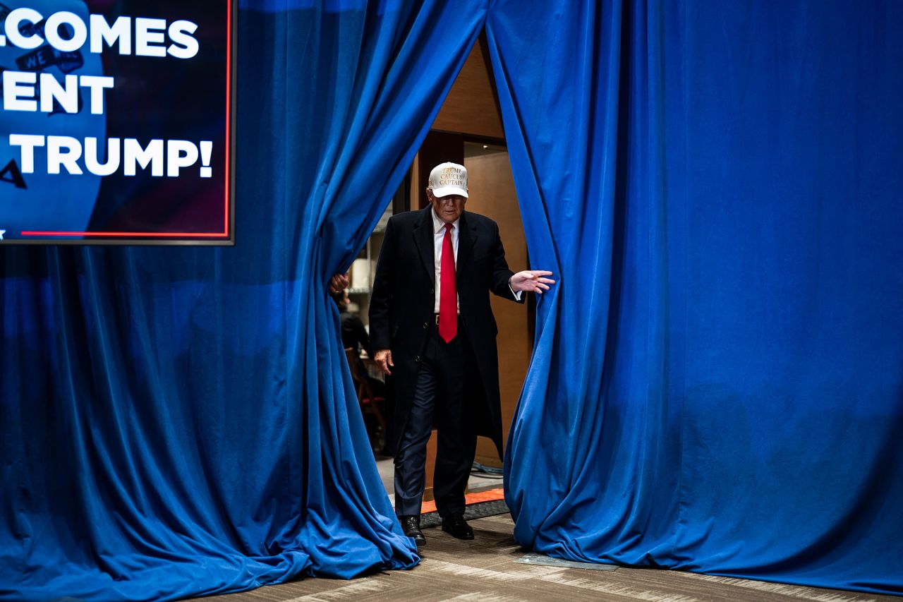 Former President Donald Trump walks out to speak at a campaign rally held at Simpson College in Indianola, Iowa on Sunday, January 14.