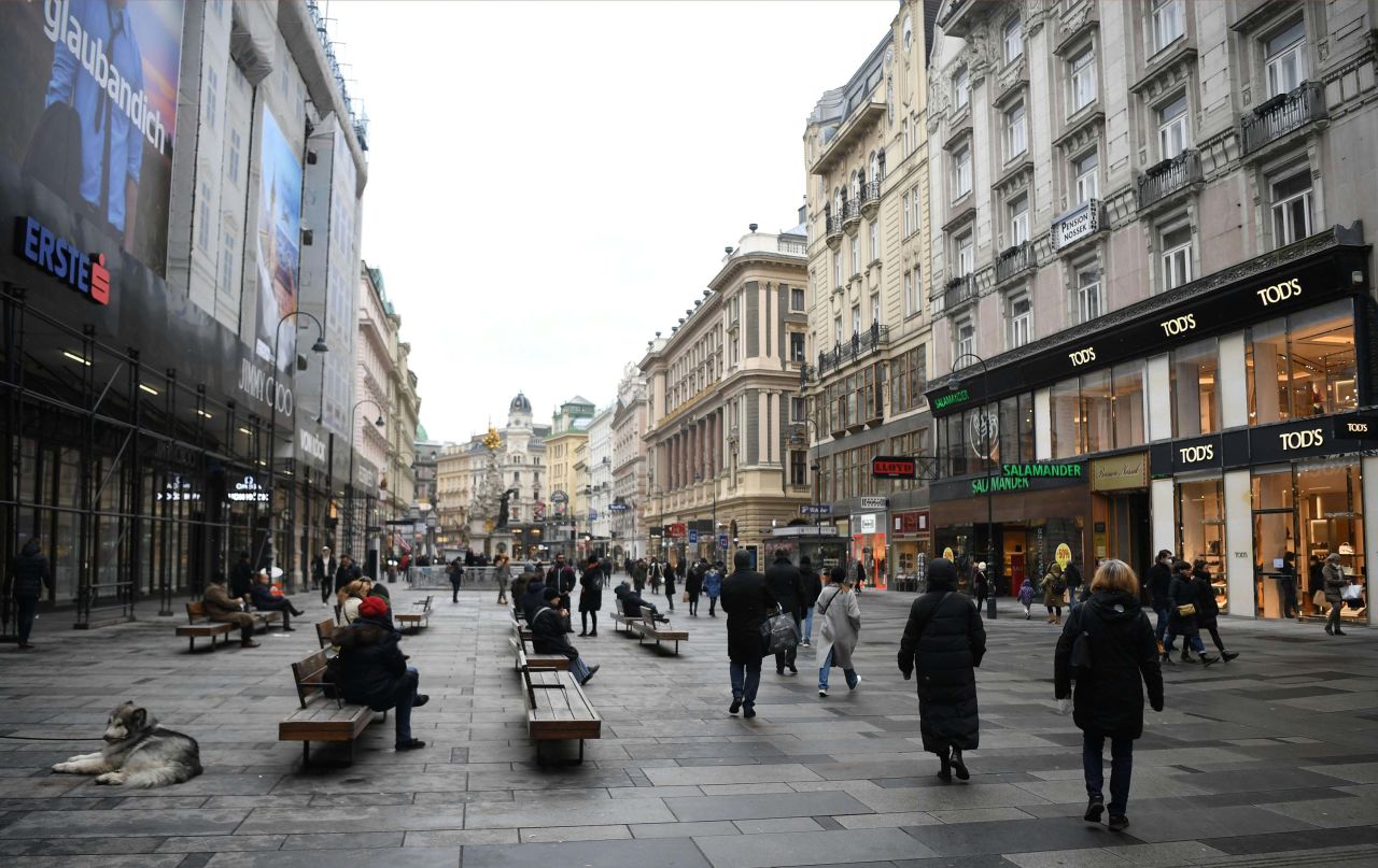 People shop in Vienna's Kaerntner Street as Austria reduces its lockdown restrictions on February 8.