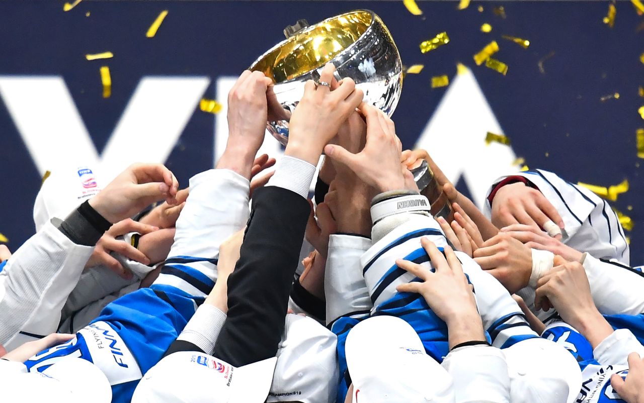 Finland's players celebrate after winning the Men's Ice Hockey World Championships final against Canada on May 26, 2019 in Bratislava, Slovakia.