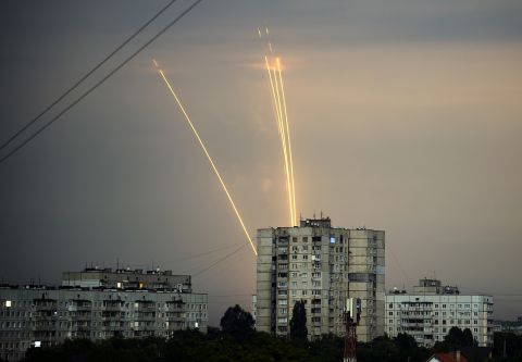 Russian rockets launch against Ukraine from Russia's Belgorod region are seen at dawn in Kharkiv, Ukraine on Monday, Aug. 15.