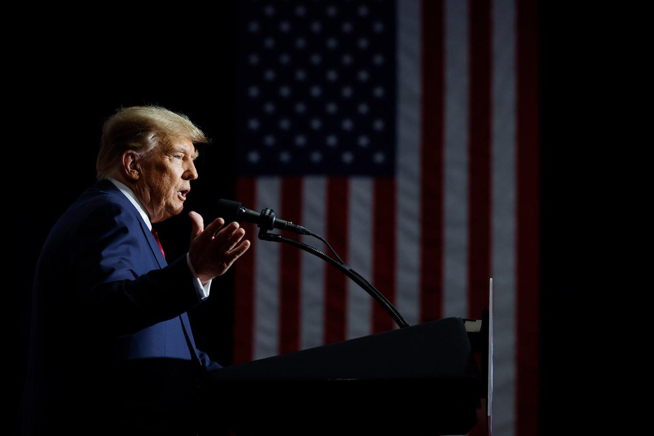 Former President Donald Trump speaks at his caucus night event at the Iowa Events Center in Des Moines.