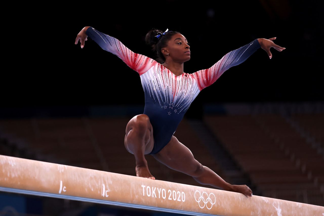 Simone Biles warms up on the balance beam prior to Tuesday's final.