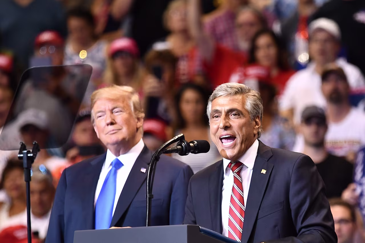 Republican Senate candidate Lou Barletta speaks in front of US President Donald Trump at a political rally in Pennsylvania