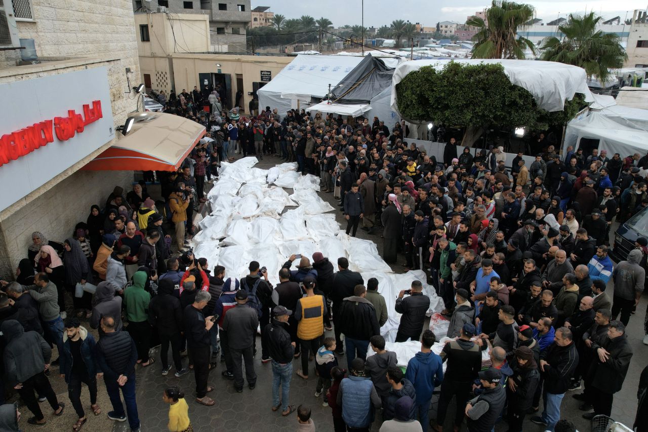 A mass funeral is seen at the Al-Aqsa Hospital in central Gaza on Monday.