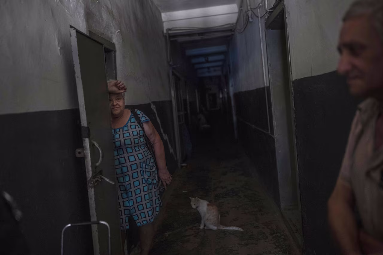 Civilians shelter in a basement in Soledar, Ukraine, as heavy shelling continues, on Aug. 10. 