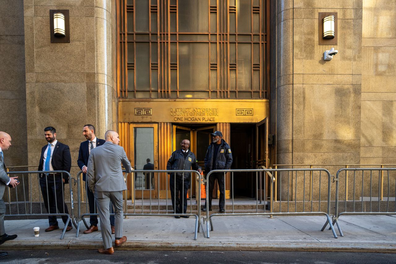 Police officers stand outside of Manhattan Criminal Court on Monday, April 15.