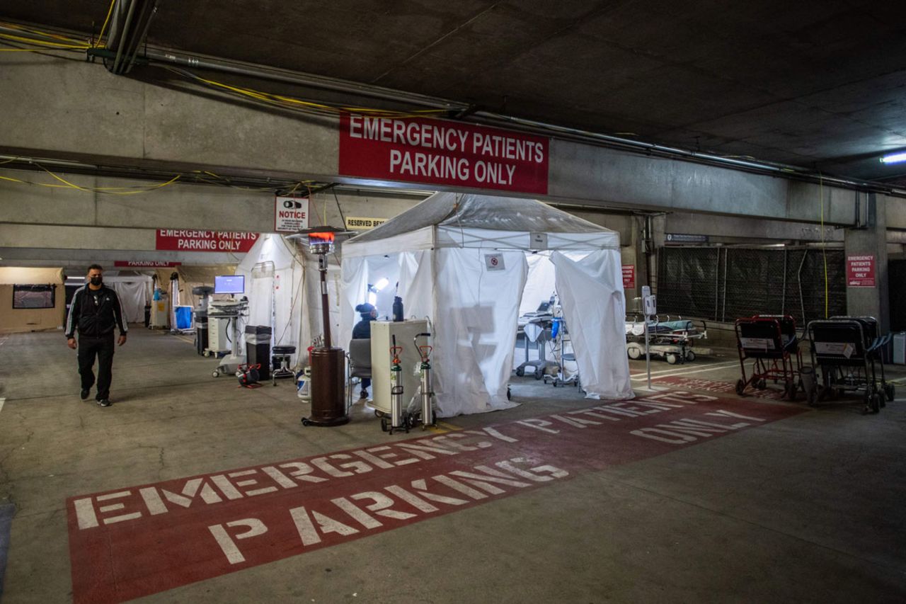 Medical Director of Providence Cedars-Sinai Tarzana Medical Center's intensive care unit, Dr. Thomas Yadegar, walks inside a temporary emergency room built into a parking garage in Tarzana, California on January 3.