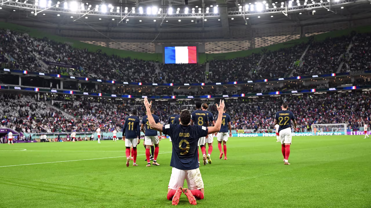 France's Olivier Giroud celebrates scoring his team's first goal against Poland on Sunday.